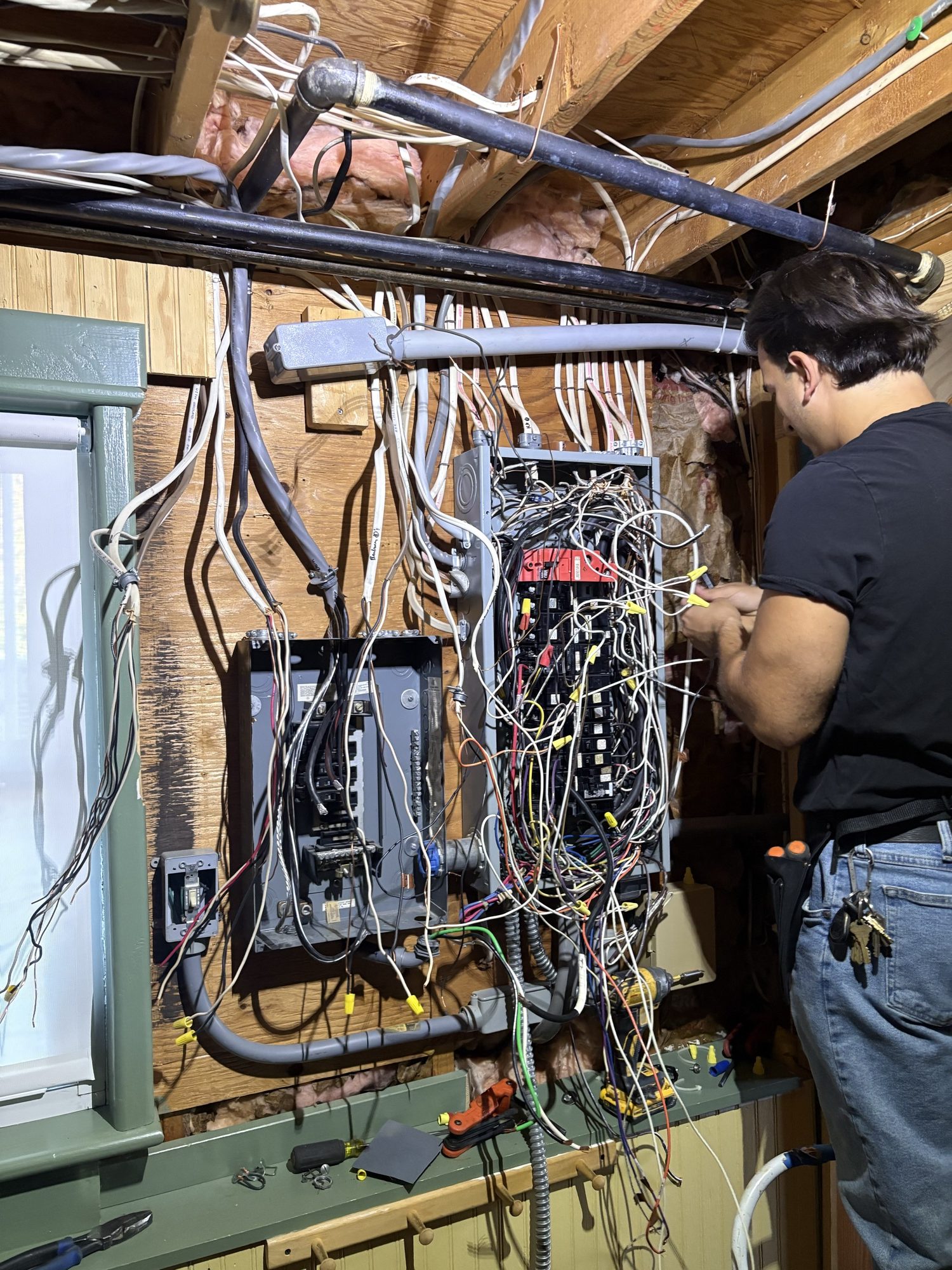 Electrician working in panel