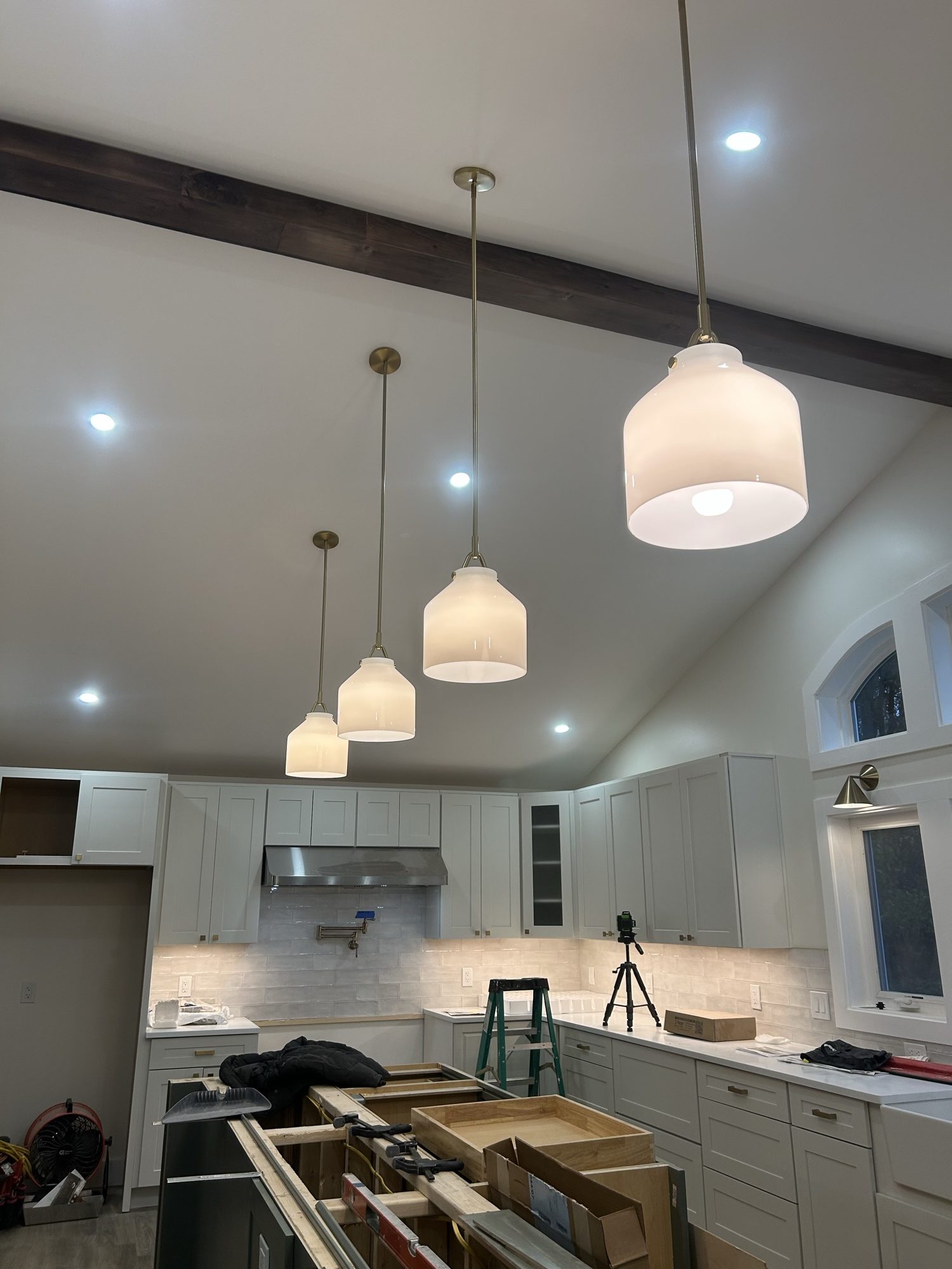 Custom pendant lighting installed in a modern kitchen