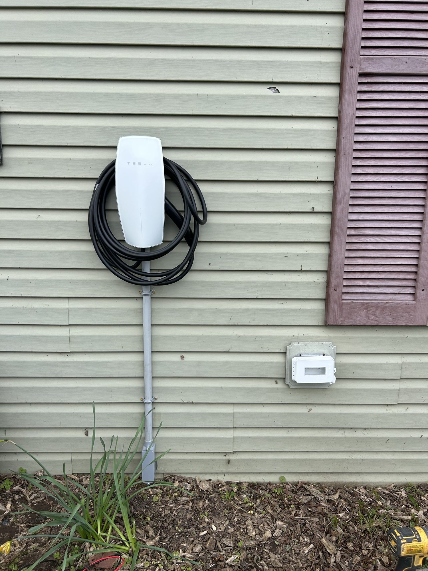 Exterior EV charger installation